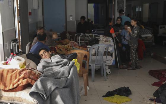 Wounded Palestinians lie in Shifa Hospital in Gaza City on Friday, Nov. 24, 2023, as the temporary ceasefire between Israel and Hamas took effect. (AP Photo/Mohammed Hajjar)