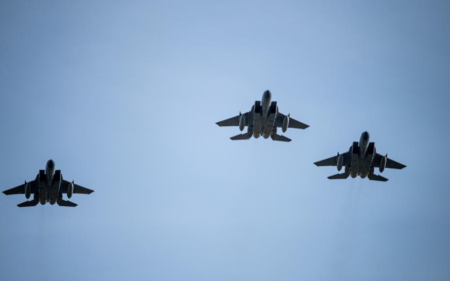 Only three U.S. Air Force F-15C Eagles assigned to the 493rd Fighter Squadron remain in formation after one peeled away during a missing man formation over RAF Lakenheath, England, June 15, 2021. The formation was flown a year to the day after 1st Lt. Kenneth "Kage" Allen, was killed when his F-15C crashed into the North Sea during an exercise.
