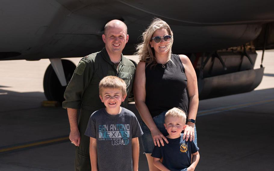 Amy Reichman Reeves poses with her husband, Cary, and sons Nate (left) and Max.