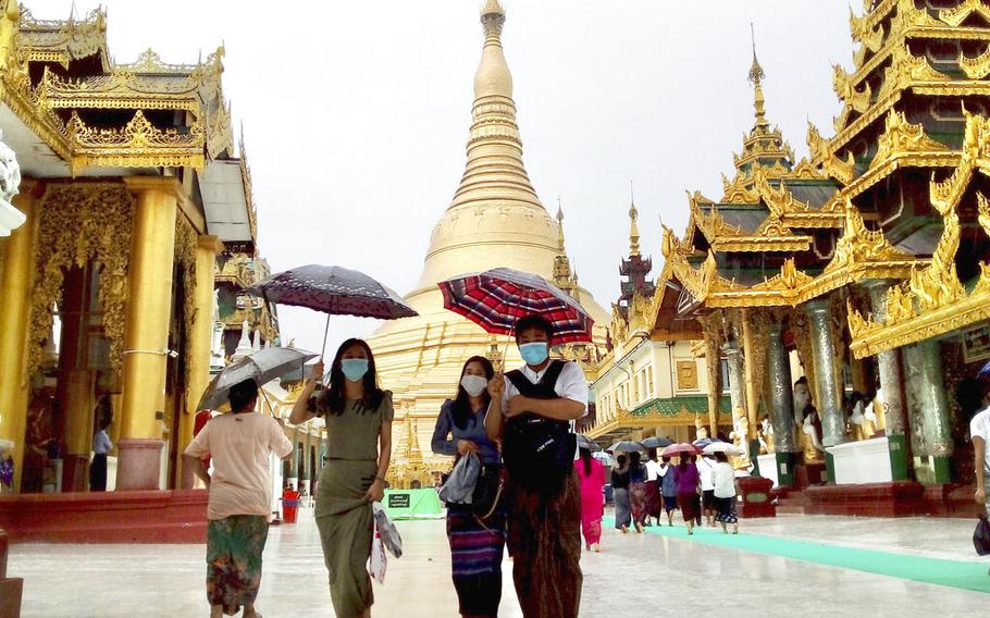 Pilgrims visit Myanmar famous Shwedagon Pagoda in Yangon, Myanmar on Sunday, June 19, 2022.  Several visitors said they came to the famous temple to say prayers for Aung San Suu Kyi, the country’s ousted leader, on her 77th birthday, which she spent in military detention.