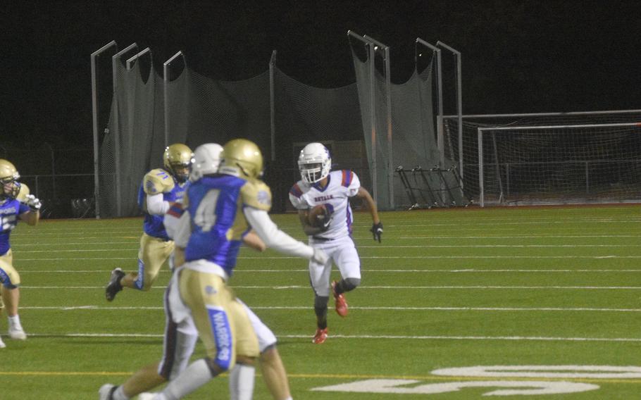 Ramstein running back DeMarius Johnson runs for a short gain against the Wiesbaden Warriors on Friday, Sept. 17, 2021,  in Wiebaden. 