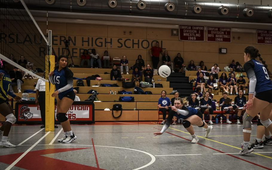 Brussels Brigand Taegan Muller makes a diving effort to reach the ball during their tight match against the Sigonella Jaguars at the DODEA Division III European volleyball semifinals on Oct. 27, 2023, in Kaiserslautern, Germany.