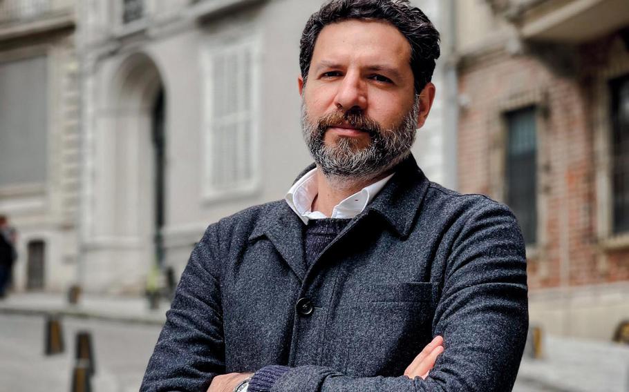 Ghaith Abdul-Ahad, an Iraqi journalist, stands in Istanbul, Turkey, in June 2022. Abdul-Ahad, who began working as a reporter in 2003, wrote a book on his experiences over the last 20 years: “A Stranger in Your Own City: Travels in the Middle East’s Long War.”