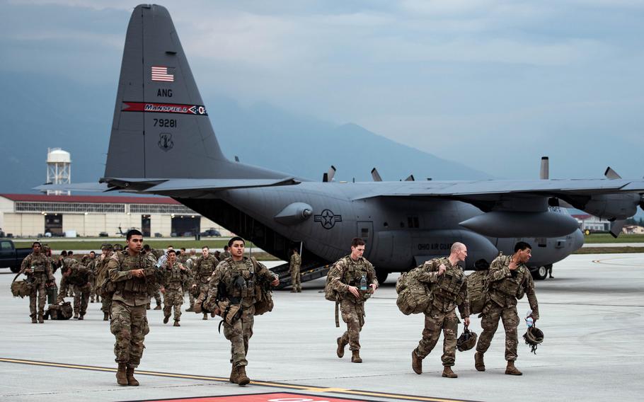 U.S. Army paratroopers assigned to 2nd Battalion, 503rd Infantry Regiment arrive at Aviano Air Base, Italy, on May 23, 2022, after their deployment to Latvia. During the deployment, the paratroopers took part in training exercises with NATO allies.