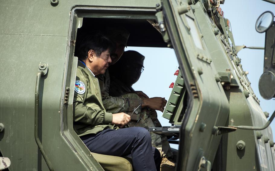 Philippines President Ferdinand Marcos Jr. takes a tour of an M142 High Mobility Artillery Rocket System, or HIMARS, at Naval Station Leovigildo Gantioqui in San Antonio, Philippines, Wednesday, April 26, 2023.