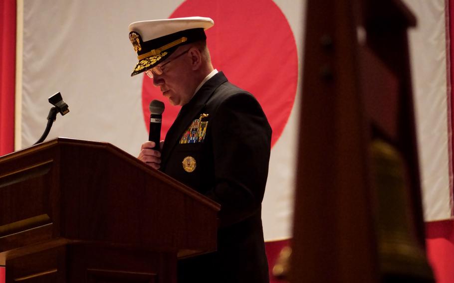 Rear Adm. Richard Seif gives a speech after taking command of Submarine Group 7 at Yokosuka Naval Base, Japan, April 13, 2022.