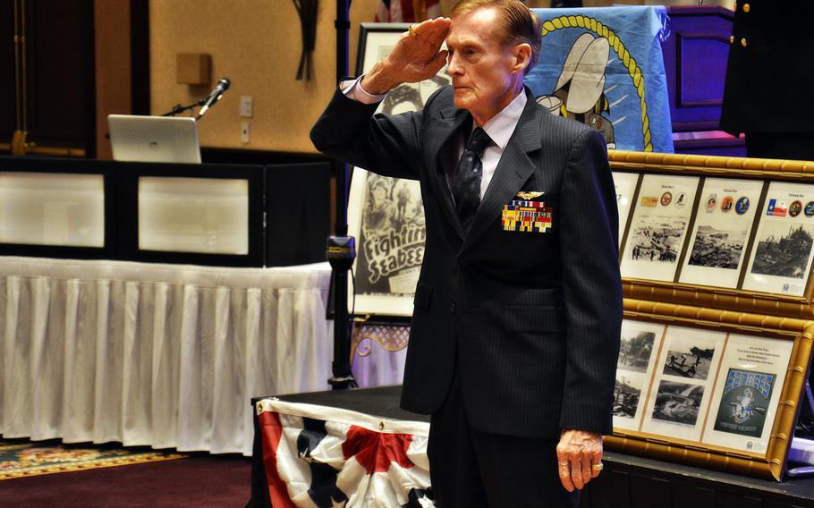 Jack Holder, a Navy veteran who saw action during the 1941 attack on Pearl Harbor, Battles of Midway and Guadalcanal and in Europe is honored during a celebration of the Navy’s 239th birthday at the Scottsdale Plaza Resort, Scottsdale, Ariz., Oct. 11, 2014.