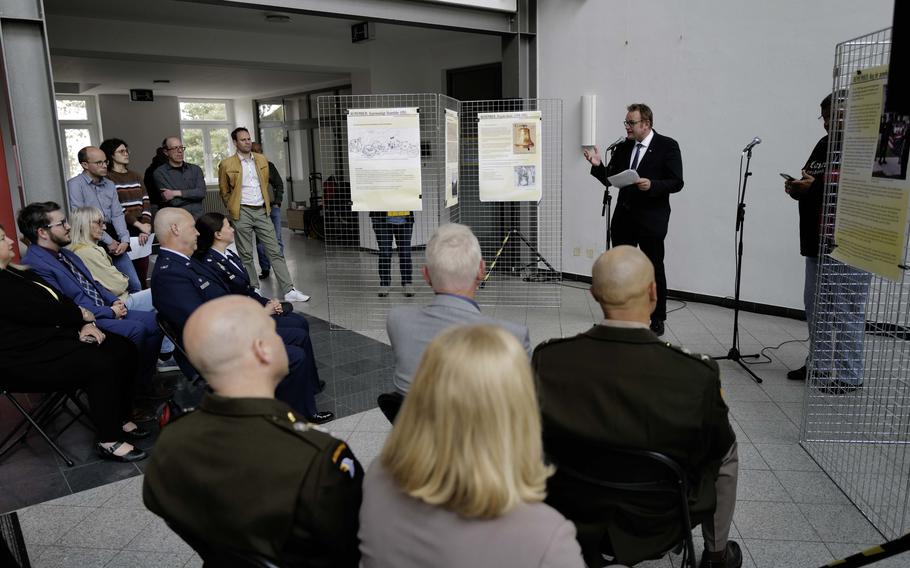 Mayor Markus Zwick speaks at the unveiling of the bilingual Husterhöh Kaserne audio tour stop in Pirmasens, Germany, on Wednesday, May 8, 2024, celebrating the city’s former ties with the American military community.
