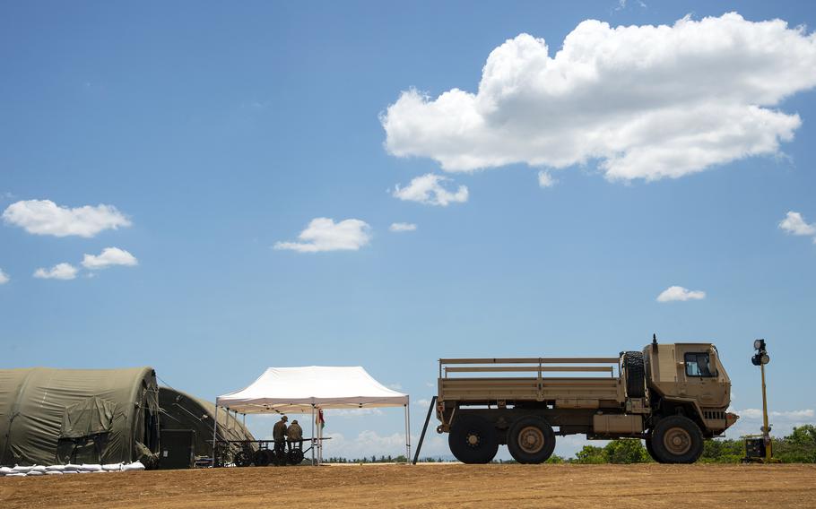 U.S. soldiers operate out of Logistics Support Area Mountain Medic, a clearing beside Lal-lo Airport the size of several football fields, during Balikatan training in the Philippines on May 4, 2024.