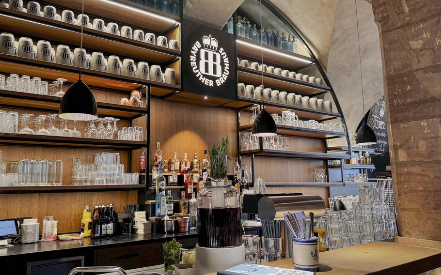  The bar at Oskar Das Wirtshaus am Markt blends modern speakeasy vibes with rustic, historic charm.