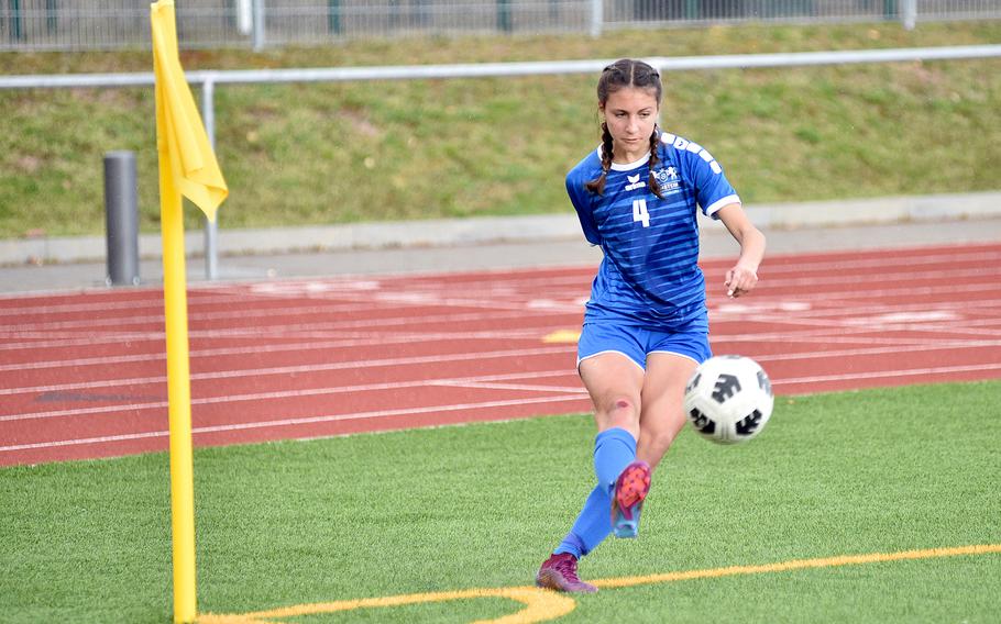 Ramstein's Isabel Fischer launches a corner during the Royals' Friday match against crosstown rival Kaiserslautern at Ramstein High School on Ramstein Air Base, Germany. The Royals won, 7-0.