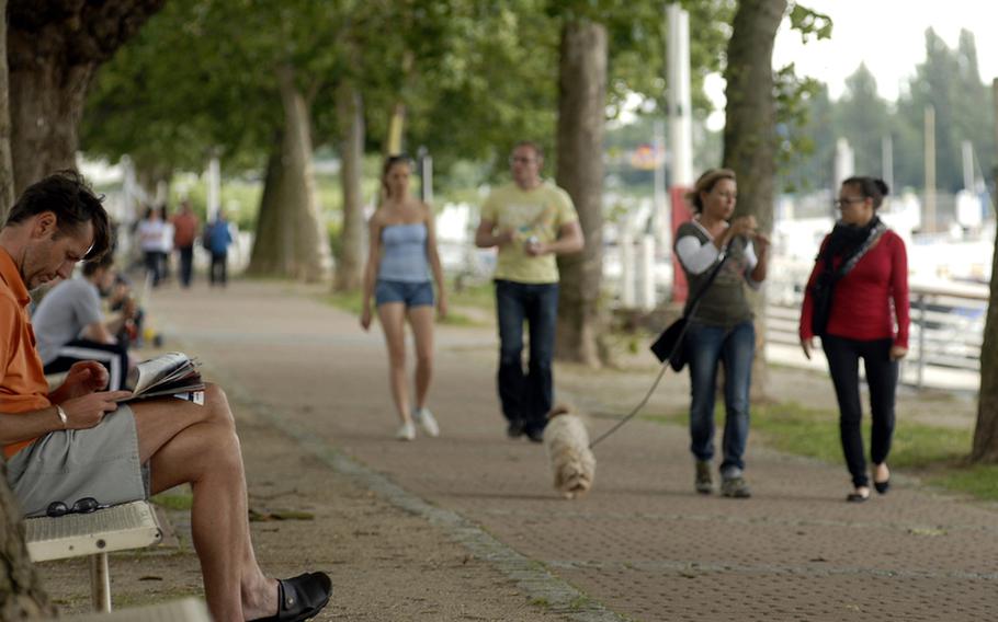 The walking and bicycle path in front of the Orange bistro in Wiesbaden, Germany, is a popular place of leisure for locals and visitors.