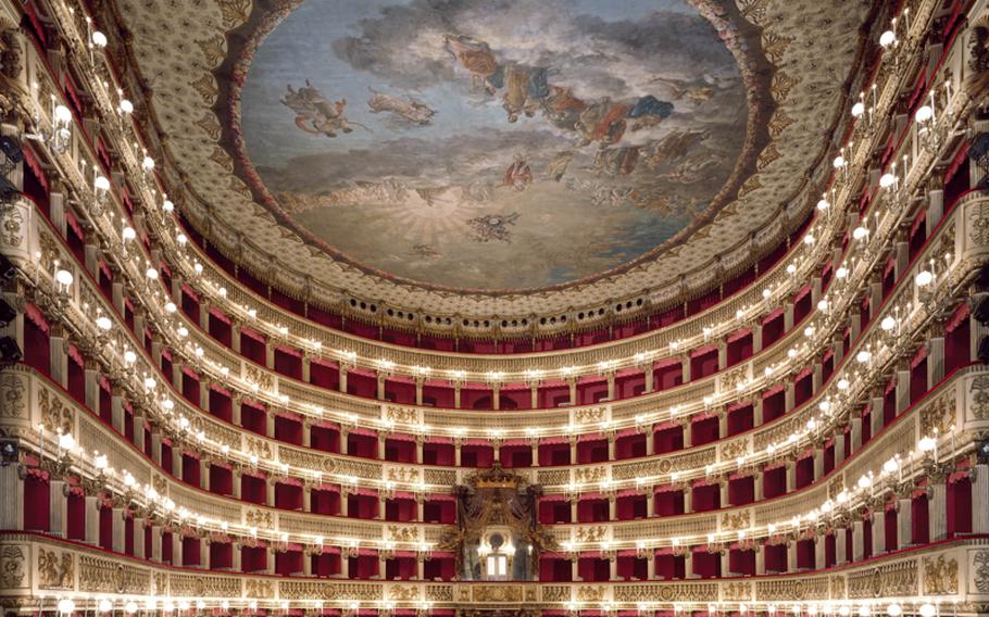 The ceiling of Il Teatro di San Carlo in Naples, Italy, is a work of art, too, depicting Apollo presenting to Minerva the greatest poets of the world.

