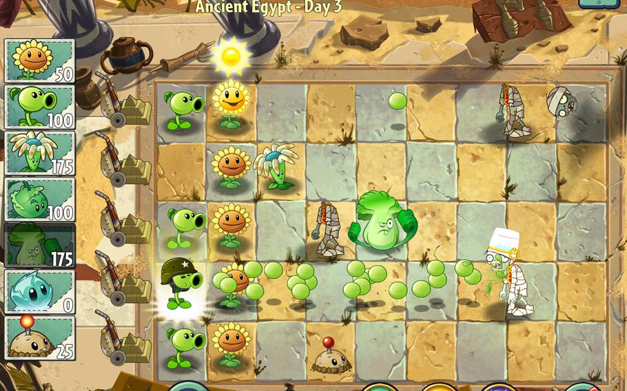 For those few in-between seconds your fingers aren't busy collecting sun or planting things, PvZ 2 has a few more tasks to manage. A few zombies even give off "plant food," a sort of steroids for plants that powers up plants in creative ways. The highlighted green plant in this photo has turned into a pea-shooting machine gunner.