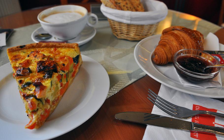 A quiche with vegetables and fish, along with a croissant, baguette and a cappucino, made for a satisfying meal at Patisserie Rebert. The  pastry shop is located in Wissembourg, France, a quaint town on the German border in France’s northern Alsace region.


