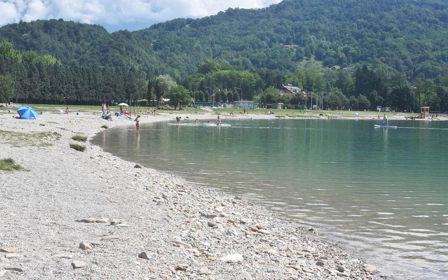 If you're looking for a sandy beach, the shores of Italy's Lago di Santa Croce don't match the numerous communities on the Adriatic Sea about an hour away. But if you're OK with rocks and pebbles, it's usually a lot less crowded than the beach resorts.
