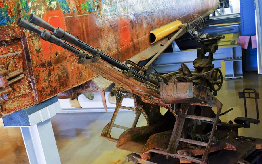 A double-barreled machine gun recovered from a North Korean spy vessel is on display at the Japan Coast Guard Museum in Yokohama. 