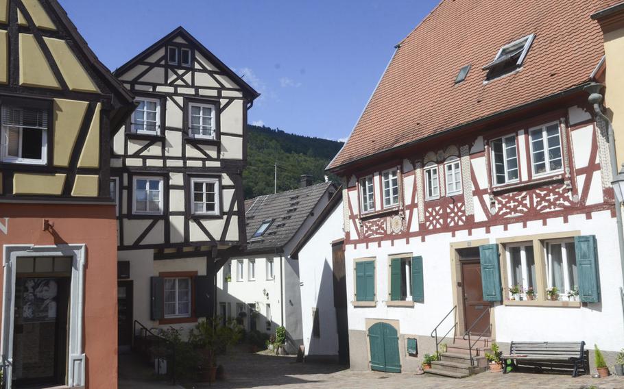 Traditional German half-timbered homes and business in the center of the medieval Baden-Wuerttemburg town of Neckargemuend, just outside Heidelberg. The town is situated along a gentle stretch of the Neckar River in the Odenwald forest.