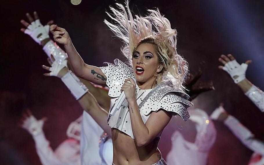 Lady Gaga, shown performing at the Super Bowl halftime show on Feb. 5, has postponed her world tour's European leg until next year because of ongoing health problems.