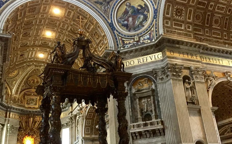 The canopy, known as St. Peter's Baccharin, and the high altar are positioned directly under the dome's oculus and above St. Peter's tomb in the basilica's lower levels. 