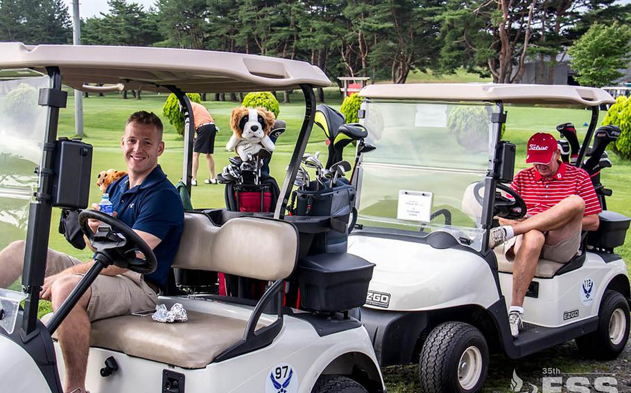 Golfers relax during a 2016 tournament at Misawa Air Base's Gosser Golf Course.
