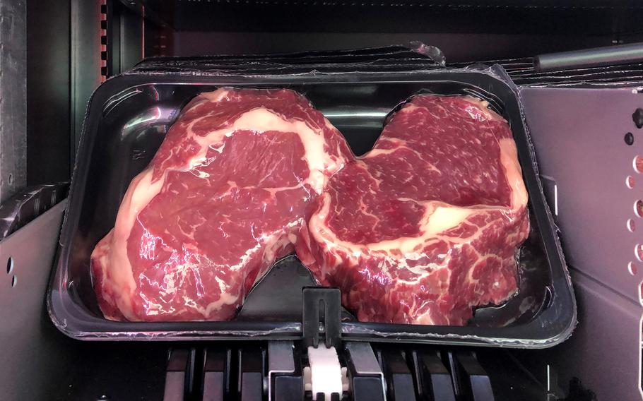 Thick cuts of beef wait inside one of the temperature-controlled vending machines outside the Zemo butcher shop in Weilerbach, Germany, on Thanksgiving Day for a purchaser. Zemo has a wide variety of products in its vending machines, which are open for business 24 hours a day, seven days a week.