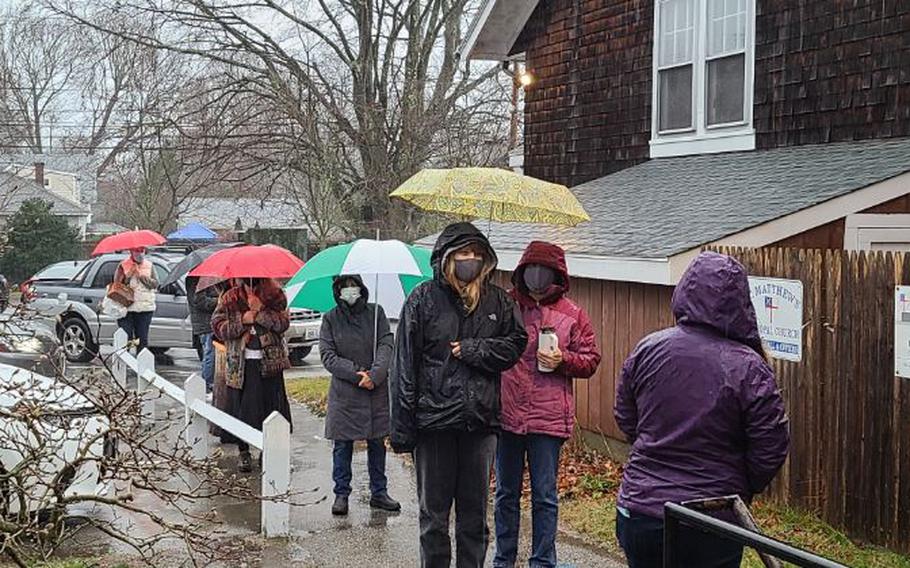 Neither rain nor COVID would keep away these socially distanced fans of St. Matthew’s Annual Christmas Fair in 2020.