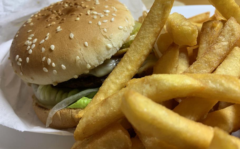 Golden fries and Boll Burger's signature sandwich, with a fried egg on top, on Dec. 8, 2020.