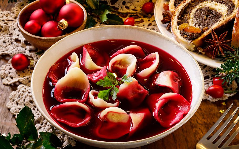 Traditional Christmas beetroot soup with small dumplings stuffed with mushrooms is the type of dish served in Poland to celebrate Wigilia. The feasting starts with the appearance of the first star.