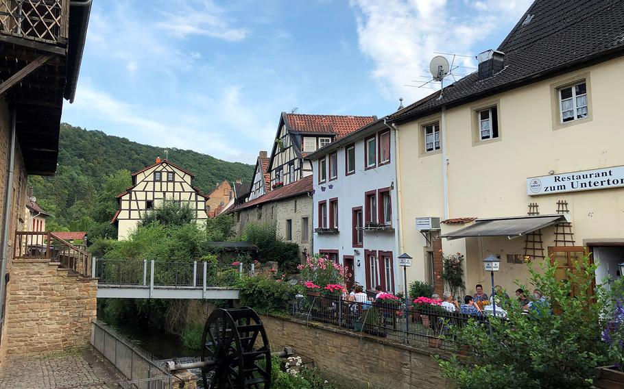 Rushing water spins a wheel and gives diners a conversation piece in Meisenheim, Germany.
