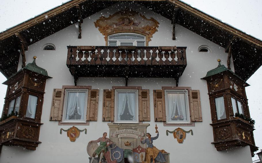 The facade of Haus Gerspach in Garmisch-Partenkirchen’s city center -- photographed during a snowfall -- shows an example of the “Lüftlmalerei” mural art found in rural areas in Bavaria.