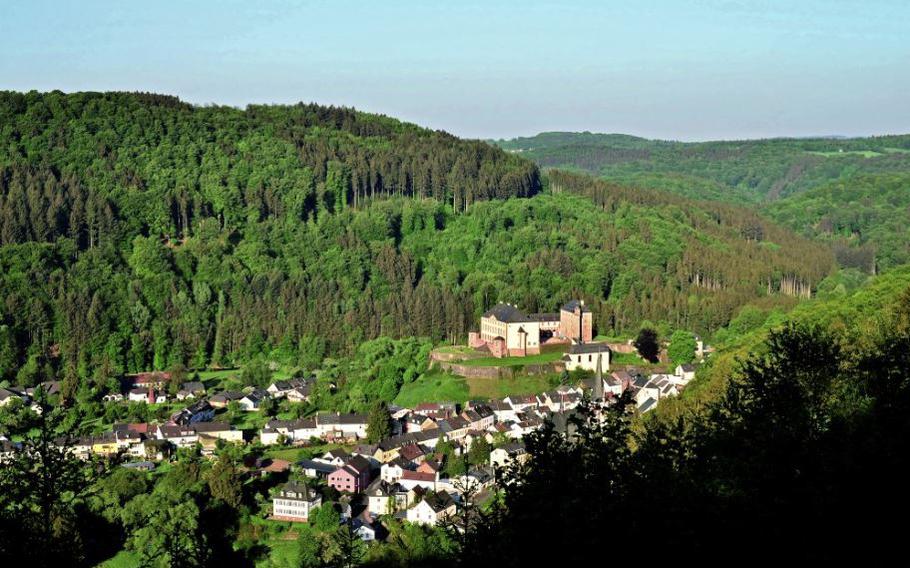 A hike north of Spangdahlem, Germany, yields a panoramic view of the village of Malberg and its castle.