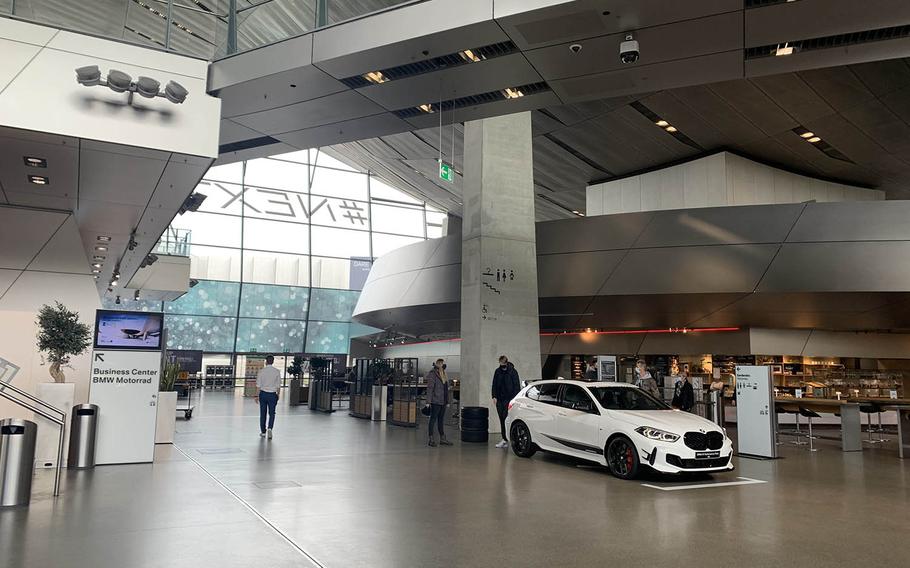 The main floor of the BMW Welt in Munich, Germany, Oct. 14, 2020. The main floor of the museum features showroom cars, a coffee shop and gift shop. The BMW Welt is scheduled to reopen its doors on March 7, 2021.
