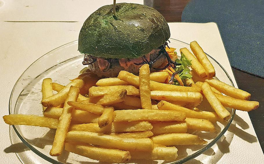 The ''Hulk'' burger from Sacellum-Cucineria Urbana in Sacile, Italy.The green bun is made with chlorophyll and the 7-ounce patty is stuffed with cheddar cheese.