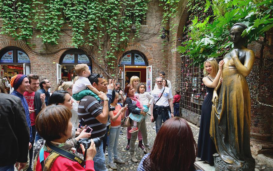 The Juliet statue in Verona, Italy, is one of the town's most popular and symbolic tourist attractions. Visitors take turns touching the right breast of the statue for luck. Or at least for a selfie.