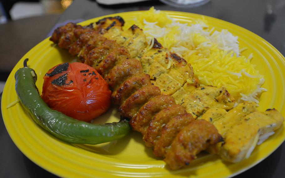 The chicken and minced lamb kebab plate from Termeh Persian Restaurant in Kaiserslautern, Germany. Diner alert: the pepper on the side brings a lot of heat when you reach the seeds.