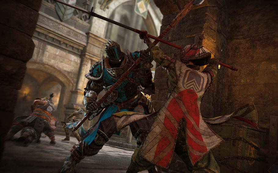 A Japanese Nobushi tries to block an attack by a Lawbringer, one of the warriors among the European knights in “For Honor.” 