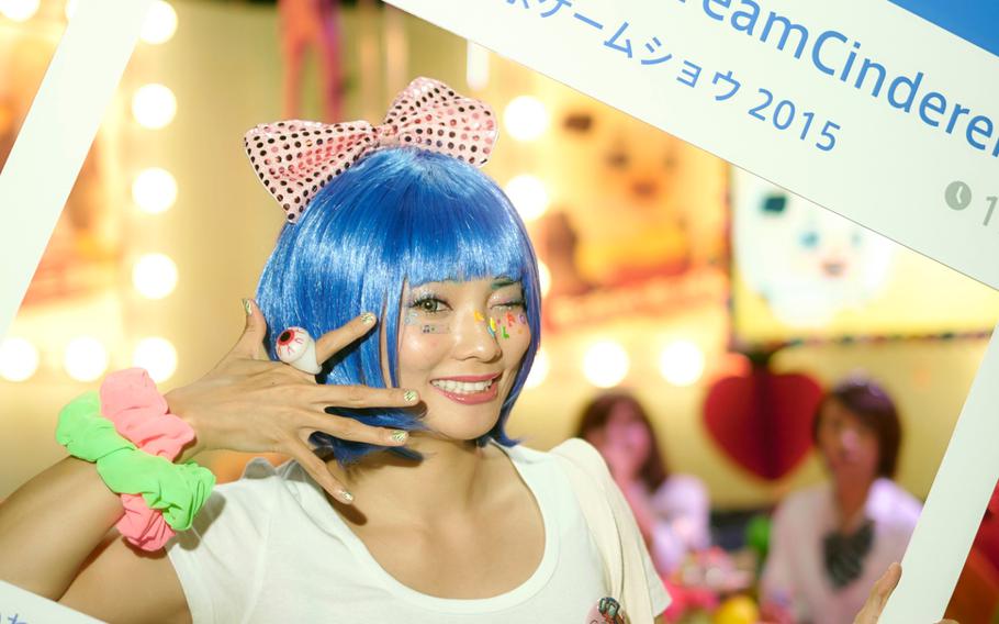 A cosplay actress for Galboa, a popular game developer for mobile operating systems, promotes a company campaign at the Tokyo Game Show 2015 in Chiba, Japan, on Friday, Sept. 17, 2015.