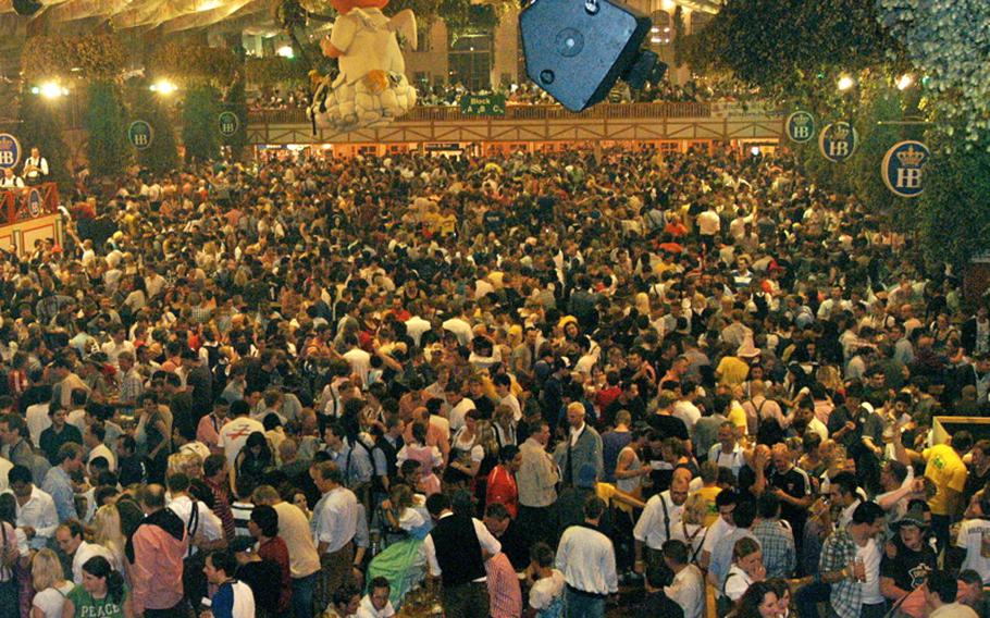 Revelers pack the Hofbrau tent, which caters to mostly international visitors from Australia, England and the United States. The tent can hold more than 7,000 people inside and an additional 3,000 in its beer garden, but it fills up fast, and the rule at Oktoberfest is that without a seat, you won't be served.