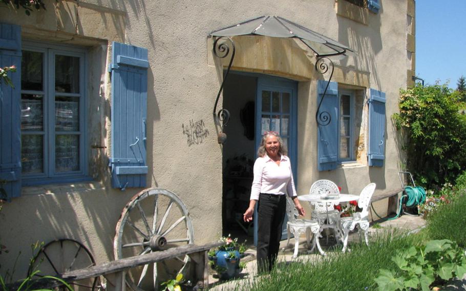 Delightful Alma Downs welcomes guests to Maison du Charron, her inviting bed and breakfast in Monpazier, France.