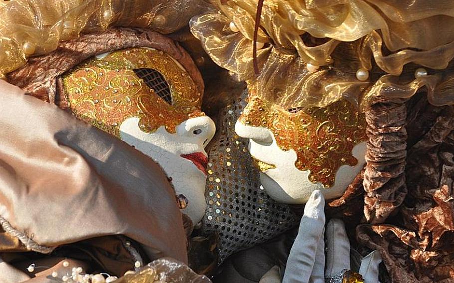 Carnevale in Venice can be romantic as well, as demonstrated by this couple.