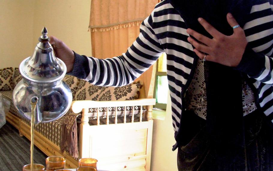 A Moroccan woman serves guests mint tea -- a tradition throughout the region.