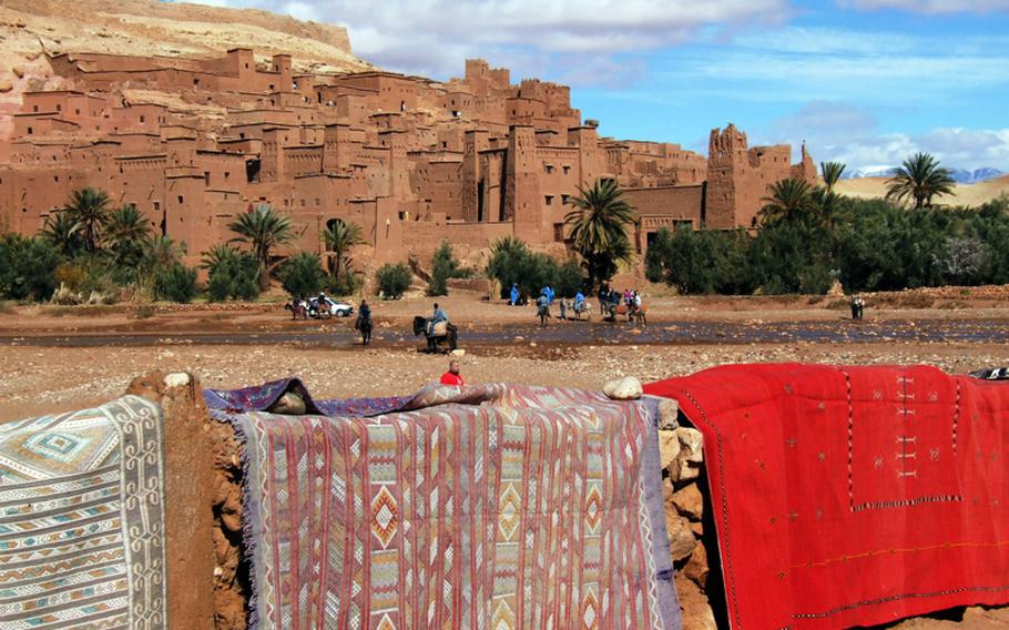 You can ride a donkey across the river to visit casbah Ait Benhaddou, a complex of packed earth buildings in Morocco, that is a UNESCO site.