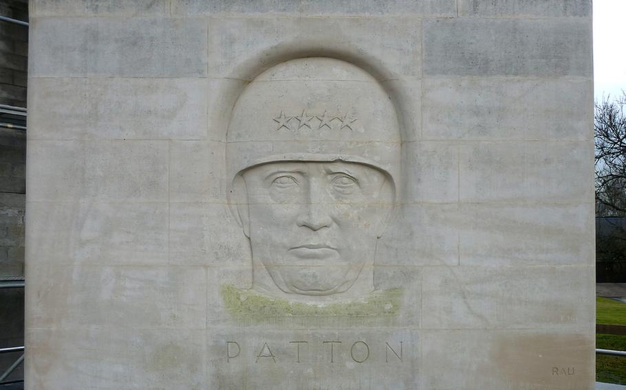 The Patton Monument at Bastogne, Belgium. Patton launched a counterattack with his 3rd Army in an attempt to stop the German offensive. The battle became known to the Allies as the Battle of the Bulge. The famed general died in Heidelberg, Germany, from injuries suffered in a traffic accident. He is buried at the American cemetery in Hamm, Luxembourg.