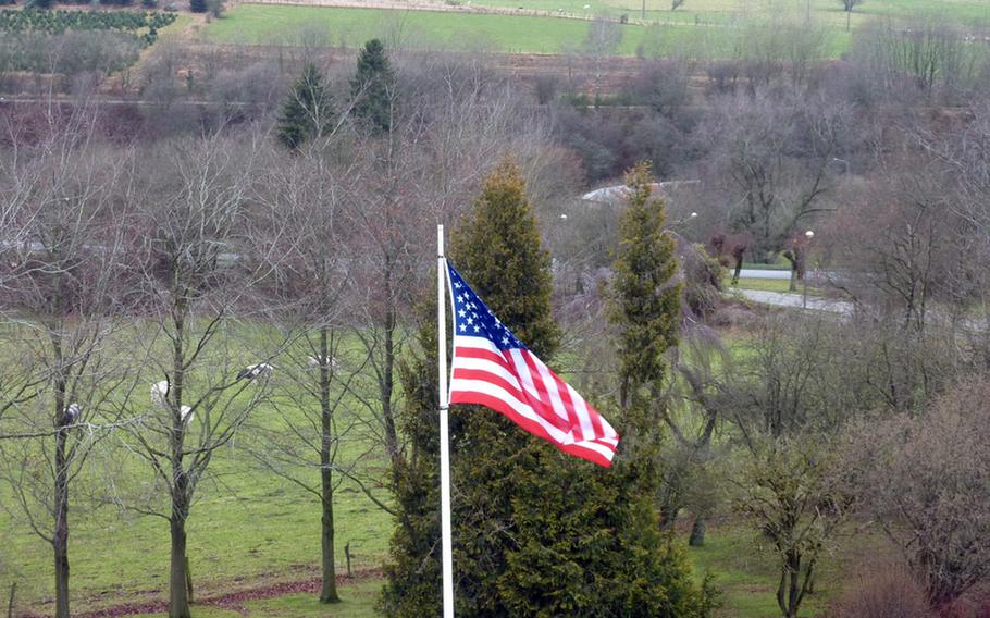 The American flag flies at the Mardasson Memorial on the outskirts of Bastogne, Belgium, above the fields where soldiers fought and died. The memorial is in the form of a five-pointed star and tells the story of the Battle of the Bulge.