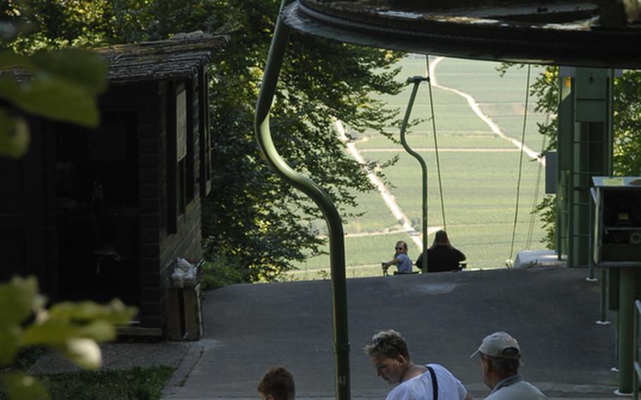 People board a chairlift heading down the hillside from the top of the Rietburg castle ruins near Edenkoben, Germany. On clear days, the 10-minute ride offers breathtaking views of Germany's southern wine region.