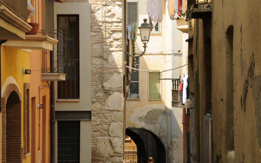As with many Italian towns and villages, Benevento has tiny streets and alleys, complete with cobblestone paths, colorful buildings and laundry drying in the spring sun.