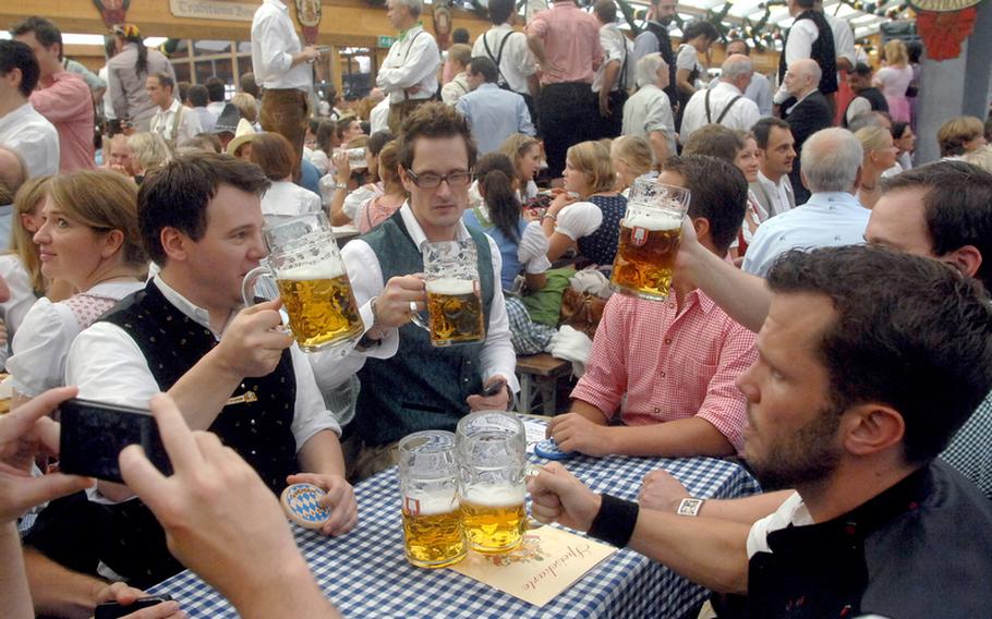 The beer will be flowing in the tents at Oktoberfest in Munich through Monday.