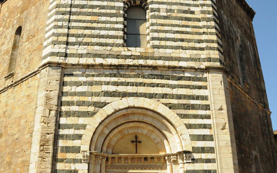 Opposite Volterra&#39;s Basilica Cathedral of Santa Maria Assunata is the eight-sided baptistery, build in the 13th century. Inside is a baptismal font created in 1760 by Giovanni Vacca, but photography inside the baptistery is not permitted.