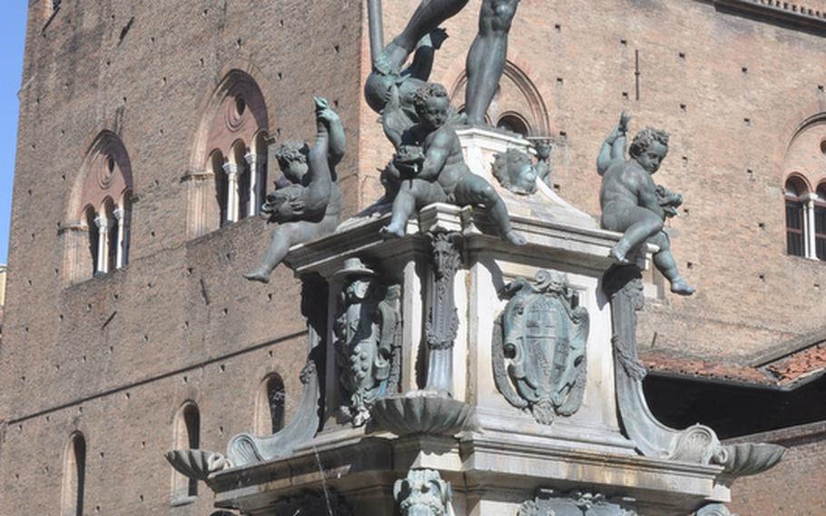 Schoolchildren check out the Neptune Fountain, one of the landmarks of the city of Bologna, Italy. The statue that depicts the Greek god of the oceans and four mermaids in somewhat provocative poses was funded by the Vatican in the 16th century as part of a project to bring fresh water to people of the city.